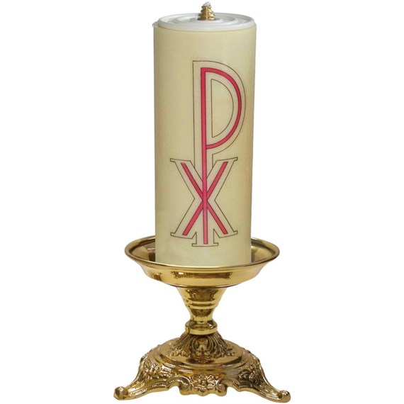 Candelero de mesa con vela y motivos litúrgicos en la base